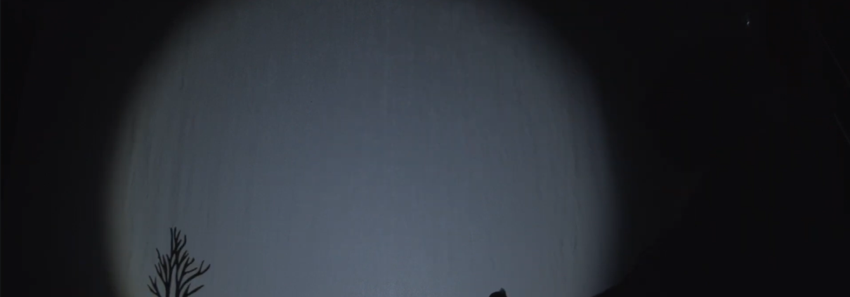Hand forming a grandfather in shadow art – scene from a customizable shadow show