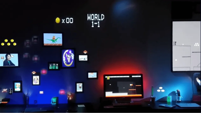 Immersive gaming setup featuring Super Mario World video mapping on the walls.